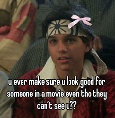 a man with a bandana on his head looking at the camera and saying, u ever make sure u look good for someone in a movie even though they can't see u??