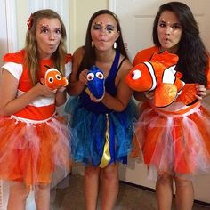 three girls dressed up as clown fish and nemo