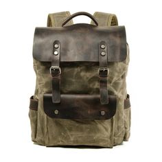 This travel backpack for men is made from premium-class 100% authentic leather with a soft handle and softback design making it comfortable to carry. It is waterproof and safe for traveling that may involve outdoor activities. It is also wear-resistant, which is suitable for hiking. It has an arcuate shoulder strap and an interior compartment. It also has a sturdy, durable external frame that has undergone the latest embossing technique.  Product highlights:   Perfect match with your travel wardrobe  Highly affordable premium quality bag  With an adjustable and soft shoulder strap  Available colors: green, khaki, gray  Bag dimensions: 30cm * 11cm * 45cm   Utilizing waxed canvas, this backpack is now enhanced with a waterproof feature, making it an ideal choice for outdoor travel in any wea Canvas Backpack Pattern, Waxed Canvas Leather Backpack, Cool Backpacks For Men, Waxed Canvas Backpack, Waterproof Laptop Backpack, Waxed Canvas Bag, Mens Backpack Travel, Retro Bags, Backpack Pattern