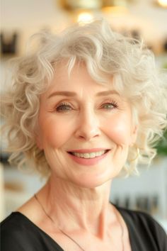 Short Curly Layers Hairstyle on smiling older woman with blonde hair.