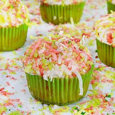 raspberry zinger christmas cupcakes with white frosting and sprinkles