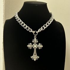 Made to order Unisex Silver Large Ornate Rhinestone Cross Statement Piece available in multiple sizes: 14 inch 16 inch 18 inch 20 inch Scroll through pictures to see size guide. Please note the size guide is based off average size, for more accurate sizing please measure your neck for where you want the necklace to sit. Rhodium plated Will not tarnish. Keep it in shiny condition by avoiding contact with aerosol sprays & lotions (Use them beforehand) . This includes your hair products, lotions an Ornate Cross, Spray Lotion, Rhinestone Cross, Festival Accessories, Statement Jewellery, Pretty Packaging, Choker Necklaces, Silver Cross, Curb Chain