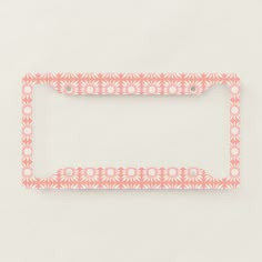 a pink license plate frame on a white background