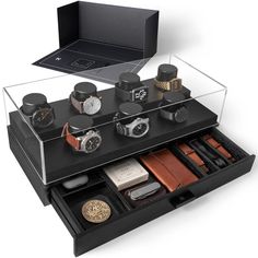 PRICES MAY VARY. YOUR WATCH COLLECTION ON DISPLAY — Why collect nice watches without a watch box for men to display them? The acrylic cover on this mens watch case keeps the dust off. Enjoy a 360-degree view of your watch collection with an XL lower drawer that provides storage for your everyday carry items. PROTECT AND PRESERVE — You invest in your watches, so it’s time to invest in a watch storage box that keeps them safe. With a smooth black wood finish, this metal-free watch organizer protec Wood Pillars, Wooden Watch Box, Watch Display Case, Mens Watch Box, Watch Organizer, Wooden Watches For Men, Watch Storage Box, Watch Holder, Premium Watches