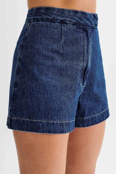 Relaxed and ready. Introducing the Abel Denim Shorts, a must-have addition to your summer wardrobe. These high-waisted shorts feature a waistband for a comfortable fit and a functional centre front fly with button closure. Designed with a relaxed fit hem and back darts, they offer both style and ease of movement. Perfect for casual outings or beach days, these denim shorts are versatile and effortlessly chic. Pair them with the Abel Denim Button Up Top and sandals for a laid-back yet polished lo Denim Blue Bottoms With Built-in Shorts, Jean Shorts With Belt Loops For Summer, Summer High-waisted Jean Shorts With Belt Loops, High Waist Cotton Jean Shorts With Belt Loops, High-waist Cotton Jean Shorts With Belt Loops, High Waist Dark Wash Bottoms With Built-in Shorts, High Waist Bermuda Shorts With Pockets, High Waist Denim Bermuda Shorts For Summer, High-waist Denim Bermuda Shorts For Summer