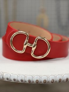 Upgrade your style with our Fashion Faux Gold Buckle Belt in Red. Made with faux leather, this designer-inspired belt adds a touch of luxury to any outfit. The 1 1/2" wide belt is adjustable with multiple hidden holes, ensuring a perfect fit for all. Elevate your look without breaking the bank. Gold Buckle Belt, Wide Belt, Elevate Your Look, Upgrade Your Style, Buckle Belt, The Bank, Belt Buckles, Perfect Fit, Faux Leather