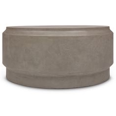 a concrete planter sitting on top of a white floor