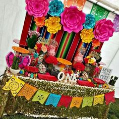 a table topped with lots of colorful decorations