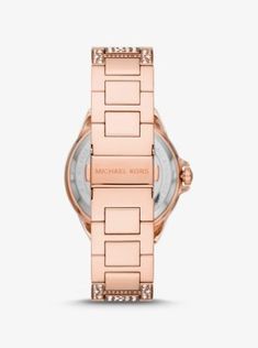 Our oversized Camille watch strikes the perfect balance between bold and elegant. Featuring allover pavé accents in a stingray-inspired pattern this modern rose gold-tone timepiece boasts sleek time stops and pavé-embellished subdials for added glamour. Wear it with everything from casual-cool ensembles to office-ready separates. Modern Rose Gold Watch For Evening, Modern Rose Gold Evening Watch, Rose Gold Diamond Watch With Round Dial For Evening, Evening Rose Gold Quartz Watches, Rose Gold Watches For Evening With Round Dial, Evening Rose Gold Watches With Round Dial, Evening Rose Gold Watches, Modern Rose Gold Diamond Watch With Subdials, Michael Kors Rose Gold Watch With Subdials