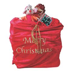 a red bag filled with christmas gifts on top of a white background and the words merry christmas in gold lettering