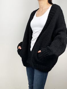 "New design for this winter! Oversize cardigan gives you cozy feel and stylelish looking! Feastures: * open front cardigan with side pockets * oversize looking * drop-shoulder sleeves * 70% wool / 30% acrylic chunky blended yarn - soft and no itchy at all Size: S(us 0-4) M(us 6-8) L(us 10-12)XL(14-16). Pls. choose size and color options. Size Measurements: S: chest 47\"(120cm), length -26\"(65cm) M: chest - 51\"(130cm) length - 27\" (68cm) L: chest 55\"(140cm), length- 28\"(70cm) XL: chest 59\"( Oversized Black Knit Cardigan, Black Chunky Knit Cardigan, Black Chunky Cardigan, Chunky Black Cardigan Outfit, Black Cardigan Outfit, Baggy Cardigan, Oversized Black Cardigan, Knit Cardigan Outfit, Oversize Cardigan