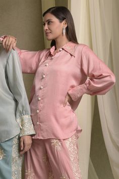 Pastel pink shirt featuring gara embroidery on the collar and sleeve cuff. - Aza Fashions Elegant Fitted Shirt With Resham Embroidery, Workwear Blouse With Embroidered Cuffs, Embroidered Cuffs Blouse For Workwear, Long Sleeve Tops With Embroidered Cuffs For Work, Formal Long Sleeve Tops With Embroidered Cuffs, Traditional Embroidered Tops For Workwear, Embroidered Collared Tops For Formal Occasions, Formal Long Sleeve Blouse With Embroidered Cuffs, Fitted Long Sleeve Blouse With Embroidered Cuffs