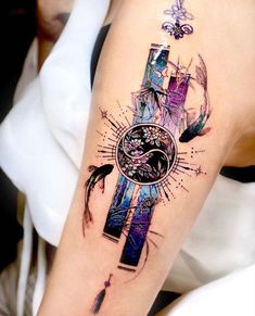 a woman's arm with a clock and birds tattoo design on the left side of her arm