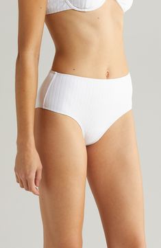 Feel confident as you lounge by the water in these high-waist bikini bottoms textured by subtle ribbing. Moderate back coverage UPF 50+ sun protection 92% recycled polyamide, 8% spandex Hand wash, dry flat Imported White Seamless Bottoms For Poolside, Summer Ribbed Poolside Bottoms, Ribbed Bottoms For Poolside Summer, Summer Ribbed Bottoms For Poolside, Ribbed Swimming Bottoms For Summer, Ribbed Beachwear Bottoms For Summer, White High Waist Bottoms With Lined Body, White Lined Bottoms For Poolside, High-cut Leg Bottoms With Lined Body