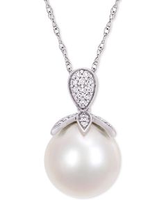 A glistening cultured freshwater pearl dangles from a diamond-encrusted cap on this truly stunning pendant necklace. Classic White Diamond Necklace With Polished Finish, Elegant Macy's Jewelry With Pave Setting, Macy's Elegant Diamond Necklace With Accents, Macy's Elegant Jewelry With Pave Setting, Elegant Macy's Diamond Necklace With Accents, Elegant Macy's Diamond Necklace With Diamond Accents, Elegant White Gold Diamond Necklace From Macy's, Elegant White Gold Macy's Necklaces, Macy's White Jewelry With Pave Setting