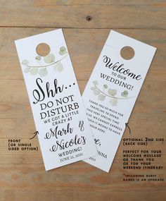 two door hangers with the words, welcome and wedding written on them in black ink