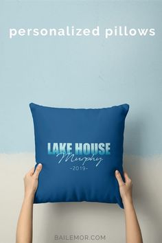 someone holding up a blue pillow that says lake house wedding 2013 on it and the words, personalized pillows