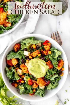 two white bowls filled with chicken salad and topped with avocado dressing on top