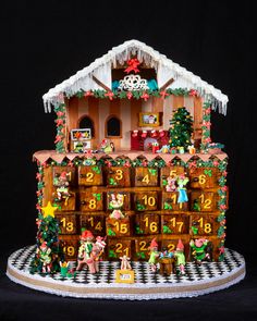 a gingerbread house decorated with christmas decorations