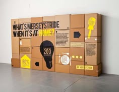 a large cardboard box that has some type of advertisement on the front and side of it