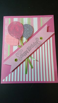 a pink card with two hearts and a ribbon on it that says happy birthday to you