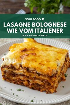 lasagne bologinese with cheese and sauce on a white plate next to parsley