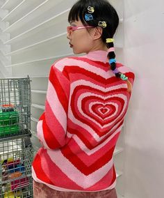 Harajuku Kawaii Fashion Y2K Heart Knit Sweater PRODUCT DETAILSSIZE INFOOne Size - Bust 92cm/36.2", Shoulder 40cm/15.7" NOTE: DUE TO VERY HIGH DEMAND, PLEASE ALLOW 12-20 DAYS FOR DELIVERY TO THE US, AND 20-45 DAYS TO THE REST OF THE WORLD. Y2k Pink Sweater For Fall, Cute Knitted Acrylic Tops, Kawaii Long Sleeve Knitted Sweater, Kawaii Knitted Long Sleeve Sweater, Pink Harajuku Style Winter Sweater, Kawaii Knit Sweater For Fall, Pink Harajuku Long Sleeve Sweater, Cute Pink Heart Print Sweater, Y2k Knitted Sweater For Spring