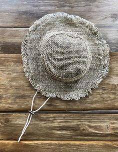 Hemp Sun Hat - Safari Hat with Adjustable String - Natural Just in from Nepal! Our Hemp Boho Sun Hats with adjustable string are perfect for the windy beach, sailing, or so much more. Keep the sun out of your eyes and look great at the same time! Also, now available in kid's sizing! Color options: Natural/Plain with String Hemp Boho sun hats are made from 100% hemp with a soft organic cotton lining, wire brim makes it easy to reshape. Wide brim perfect to protect your head and face from too much Adjustable Natural Bucket Hat For The Beach, Adjustable Natural Bucket Hat For Beach, Natural Adjustable Beachy Bucket Hat, Adjustable Beachy Hats For Outdoors, Adjustable Beachy Hat For Outdoor, Adjustable Natural Sun Bucket Hat, Natural Adjustable Sun Bucket Hat, Adjustable Country Style Bucket Sun Hat, Festival Lightweight Adjustable Hat