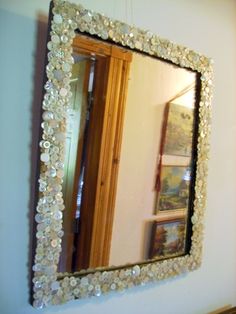 a large mirror hanging on the wall