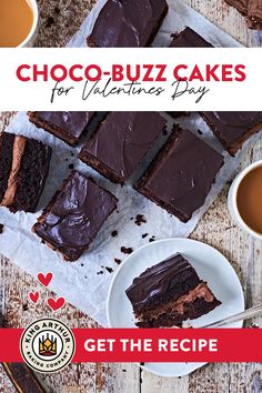 chocolate - buzzz cakes for valentine's day are on the table with two cups of coffee