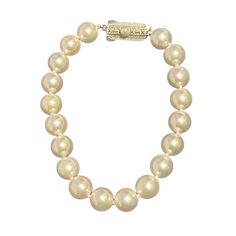 Authentic Mikimoto Estate Akoya Pearl Bracelet 7.25" Sterling Silver 8.5 - 8 mm M398This elegant Authentic Mikimoto Estate Akoya pearl bracelet is made of 19 Japanese Akoya pearls with a sterling silver clasp. TRUSTED SELLER SINCE 2002PLEASE SEE OUR HUNDREDS OF POSITIVE FEEDBACKS FROM OUR CLIENTS!!FREE SHIPPINGDETAILS19 Fine Quality Japanese Akoya PearlMeasurements: 8.5 - 8 mm mm ApproxLength: 7.25 InchesMaterial: Sterling Silver This Mikimoto Japanese Akoya Pearl Bracelet has a silver clasp whi Classic Single Strand Round Bracelet, Classic Gold Bracelet With Single Strand Round Beads, Classic Pearl Bracelet With Round Beads And Oyster Style, Classic Round Pearl Jubilee Bracelet, Classic Round Jubilee Pearl Bracelet, Formal Round Pearl Bracelet, Classic Yellow Gold Pearl Bracelet With Round Beads, Classic Gold Bracelet With Pearl Charm, Classic Gold Pearl Jubilee Bracelet