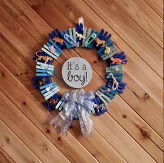 it's a boy wreath made out of clothes pins