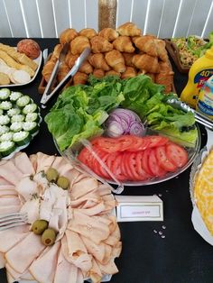 a table topped with lots of different types of food