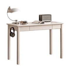 a desk with headphones and a computer on it, in front of a white background