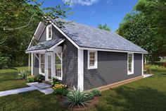 a small gray house sitting on top of a lush green field