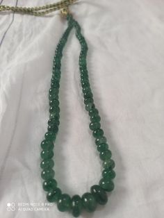 17''Natural Green Strawberry Quartz AAA 175 Carat Fine Quality Natural Beryl Smooth Rondelle 5-8 MM Beads Gemstone Necklace Stone :Natural Green Strawberry Quartz Shape :- fancy Round Necklace - 17 inch 1 line string Size :- 5 - 8MM Weight :- 175 carat Polish :- Handmade Purity :- 100% Natural Gemstone color - green makes a great gift for your loved ones. It is known as the 'love stone' as the message it emits is the strong vibration of unconditional love, joy, warmth and healing. As quartz crys Green Crystal Necklaces With Round Hand-strung Beads, Spiritual Emerald Beaded Necklace With Round Beads, Spiritual Beaded Emerald Necklace With Round Beads, Healing Single Strand Round Bead Gemstones, Emerald Necklace With Round Gemstone Beads, Pumpkin Necklace, Green Strawberry, Carnelian Bracelet, Necklace Stone