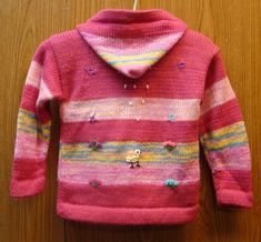 This adorable hooded zip up sweater is perfect to keep your child warm and stylish in the winter months. Hand knitted, hand dyed and made with 20% Alpaca 80% Acrylic SALE: Was $36, Now $29 Playful Winter Hoodie Outerwear, Playful Hoodie Outerwear For Winter, Pink Cozy Hooded Jacket For Winter, Cozy Pink Hooded Winter Jacket, Pink Winter Sweater With Drawstring Hood, Winter Pink Sweater With Drawstring Hood, Pink Drawstring Hood Sweater For Winter, Pink Winter Hooded Jacket With Adjustable Hood, Cozy Pink Hooded Sweater