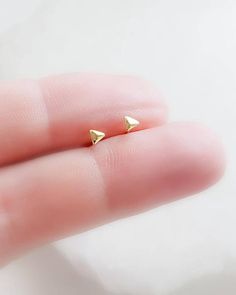 14k Gold Tiny Triangle Studs • Delicate  Studs • Gold Triangle Studs • Little Stud Earrings • Minima Dainty Earrings With Simple Design For Gifts, Tiny Simple Gold Cartilage Earrings, Tiny Gold Minimalist Earrings, Tiny Minimalist Gold Earrings, Minimalist Triangle Earrings For Everyday, Dainty Triangle Jewelry Gift, Trendy Gold Triangle Earrings, Everyday Gold Triangle Earrings, Gold Triangle Stud Earrings