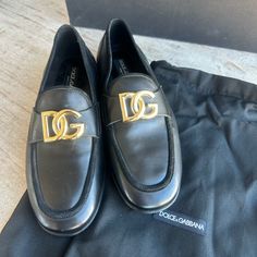 Still On The Dolce & Gabbana Website Retailing For $945. These Are A Men’s 5, But I Would Say Fit A Woman’s 8. I Am A True 7 1/2 And They Are A Tad Too Big For Me. Pristine Condition In Box, With Dust Bags, Never Been Worn! Excellent Gift Will Ship Out Same Day If Order Received By 12pm Est. 100% Authentic, The Loafers Are Gorgeous And Will Speak For Themselves. Elegant And Sophisticated, The Calfskin Ariosto Slippers Feature The Crossover Dg Logo On The Upper. Exuding Craftsmanship And Coming With A Lightweight Sole, They Are Finished Off By The Calfskin Trims And Heel Cup. Calfskin Upper Calfskin Heel Cup Calfskin Insole With Quilted Satin Insert And Branded Lab Designer Fitted Loafers For Galas, Luxury Fitted Italian Loafers, Elegant Evening Loafers, Elegant Fitted Loafers For Evening, Elegant Evening Loafers With Branded Insole, Elegant Calf Leather Evening Loafers, Elegant Evening Loafers In Calf Leather, Elegant Evening Calf Leather Loafers, Shoes Dolce Gabbana