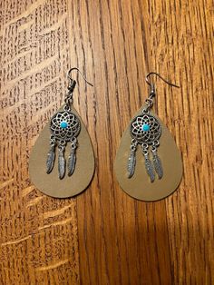 Women's Western Cowgirl Dangle Dreamcatcher with Turquoise stone Earrings and Faux brown Leather. Condition is New Turquoise Stone Earrings, Cowgirl Western, Western Cowgirls, Western Cowgirl, Turquoise Earrings, Stone Earrings, Turquoise Stone, Dream Catcher, Jewelry Earrings Dangle