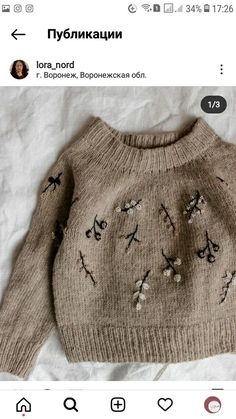 a sweater with birds drawn on it is shown in an instagramtion post from the russian language