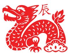 a red paper cut of a dragon with chinese writing on the front and bottom corner