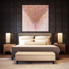 a large painting hanging above a bed in a bedroom