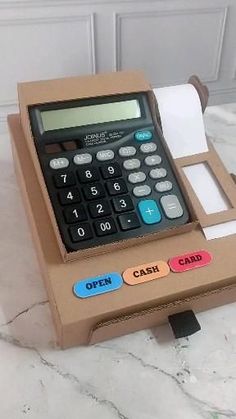 a calculator sitting on top of a counter