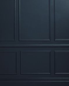 an image of a dark blue wall that is painted