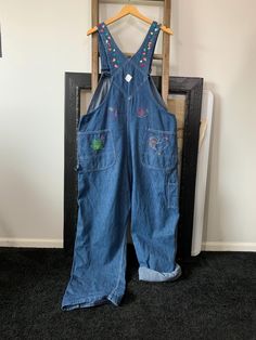 Well.. I do believe these overalls sell itself! The cross-stitch frog is my favorite🐸 They are in Excellent condition with a couple of threads broken in the stitching where the Big Mac patch is in back. I would be more than happy to send extra pictures upon request. The buckle works great and straps are adjustable. I have gently washed these in mild detergent and are now ready for their next fun owner!! All measurements are taken with the garment laying flat, double for the bust, waist and hips Embroidered Overalls, Overalls Vintage, Vintage Overalls, Big Mac, Union Made, 1970s, Overalls, Comfort Fit, My Favorite