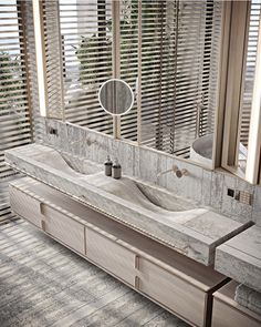 a bathroom with double sinks and wooden blinds in the window sill, along with two mirrors