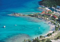 an aerial view of the beach and ocean