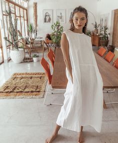 The Willow Dress Features - Sleeveless Smock Style - Drop Waist - Crew Neck - Full Length - Side Pockets Fabric 100% Linen Cold gentle machine wash. Do not tumble dry. Size Guide Small Size PhotographedS = AU 6-8US 2-4UK 4-6M = AU 10-12US 6-8UK 8-10L = AU 14-16US 10-12UK 12-14 Production Time As all items are made to order we require 5-7 business days for production Postage All packages are shipped with EXPRESS POST, and are delivered by DHL worldwide. Delivery is guaranteed within 1 week of shipment! Black Hooded Coat, Willow Dress, White Linen Dress, Sleeveless Long Dress, Latest Trend, Simple White, White Sleeveless, Linen Dresses, One Piece Swimwear