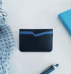 This pretty card holder is made with a beautiful navy blue leather and a shiny blue leather. It has three card slots. It is entirely sewn by hand (Seller point). Dimensions Height 7cm Width 10cm It is unique and made by myself, in France. Main Point, Card Holder Case, Leather Card Holder, Clip Wallet, Bleu Turquoise, Card Storage, Money Clip Wallet, Pretty Cards, Card Holder Leather